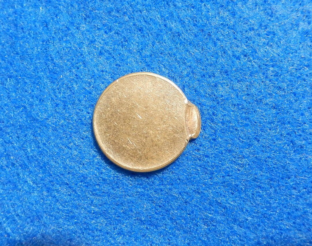 2013 nickel 30-40% off-center strike error showing design shifted with blank crescent of planchet visible